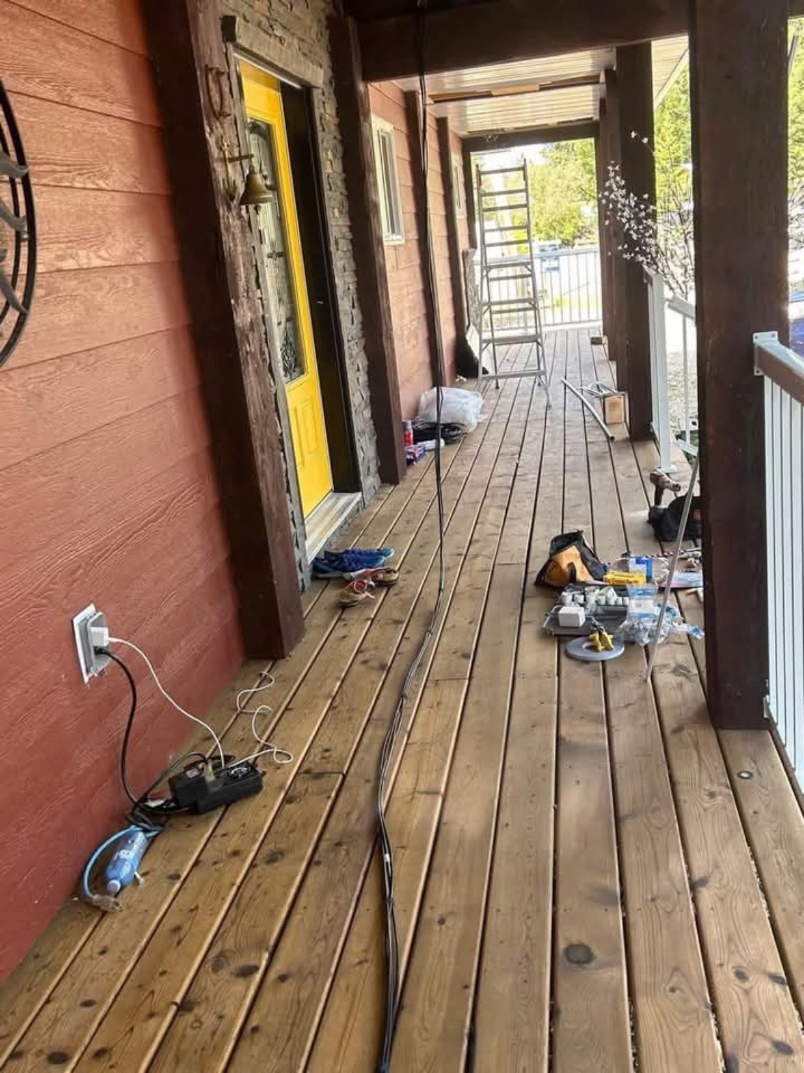 Ready Tech cabling and installation work in progress on a covered deck