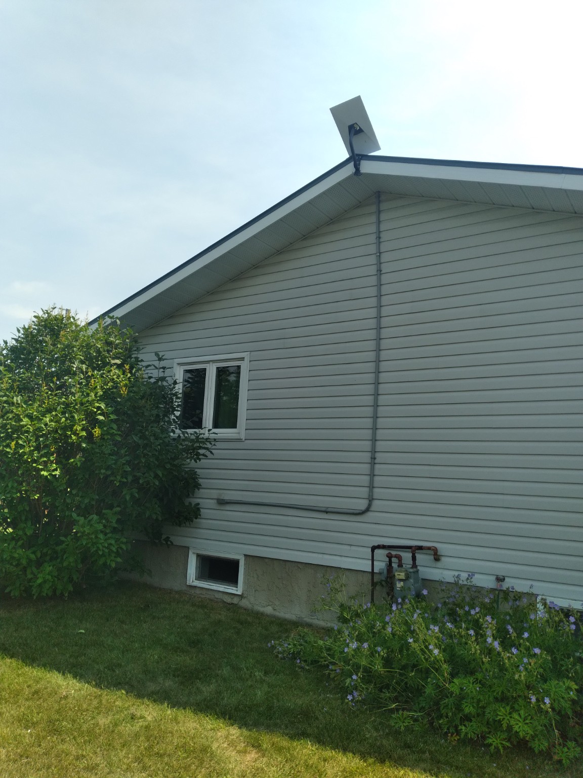 Starlink installation with protected gable conduit routing
