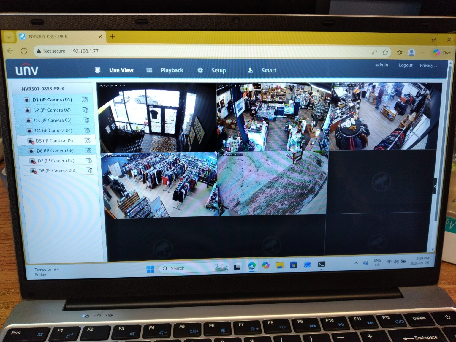Uniview NVR browser interface showing live commercial security cameras