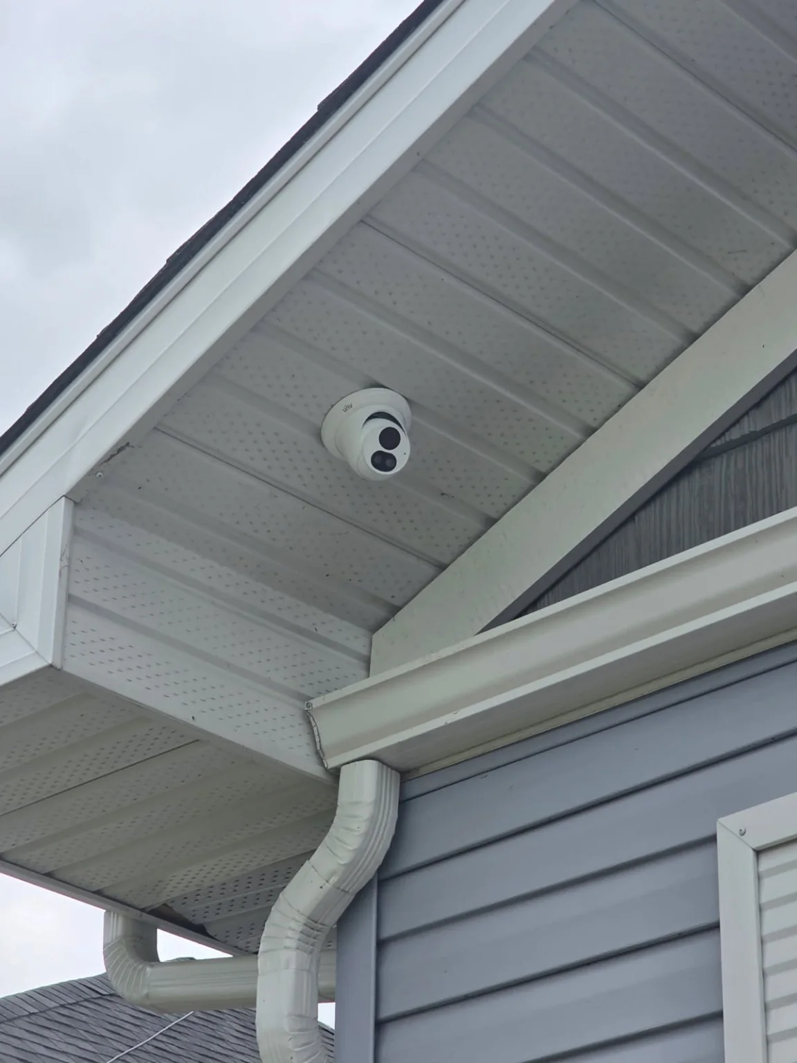 Uniview turret security camera installed by Ready Tech under a residential soffit